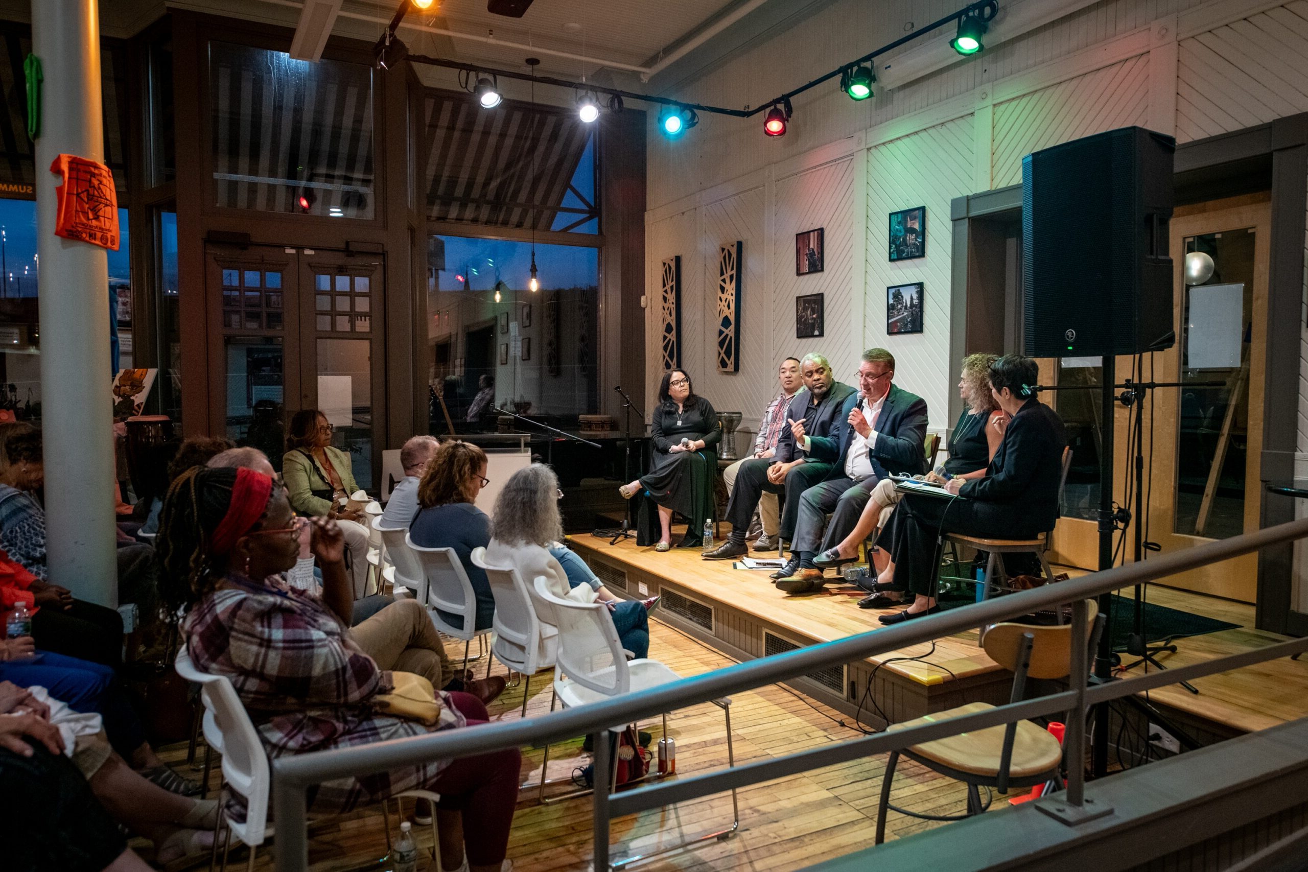 Panel discussion in front of small audience