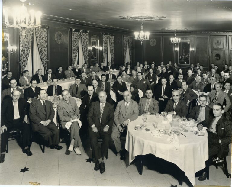 Men sitting at the 1941 MJF Campaign Meeting