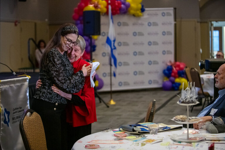 two women hugging