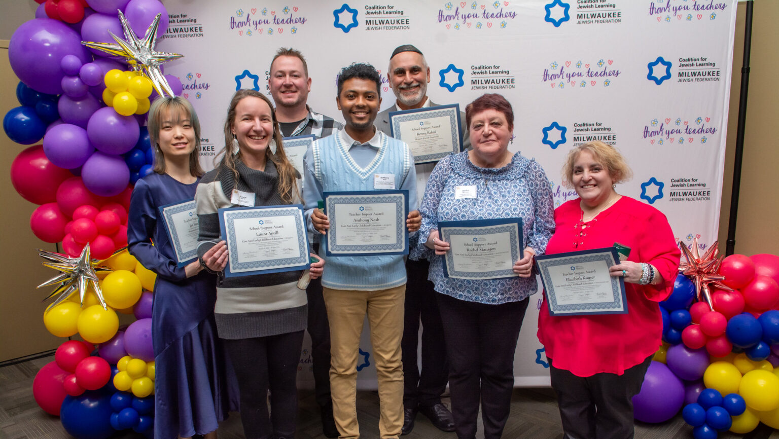 Group of teachers receiving awards