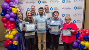 Group of teachers receiving awards