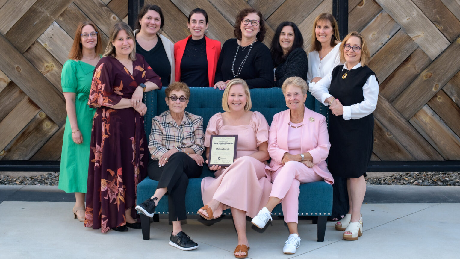 a group of multigenerational women smiling