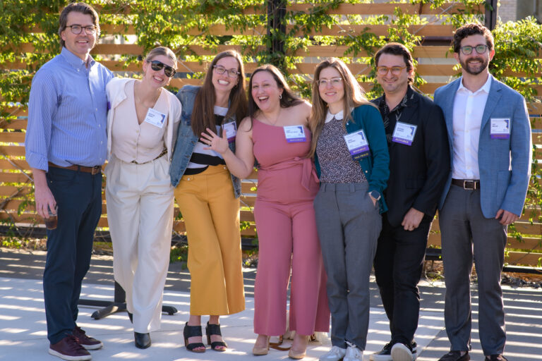 group of young professionals smiling