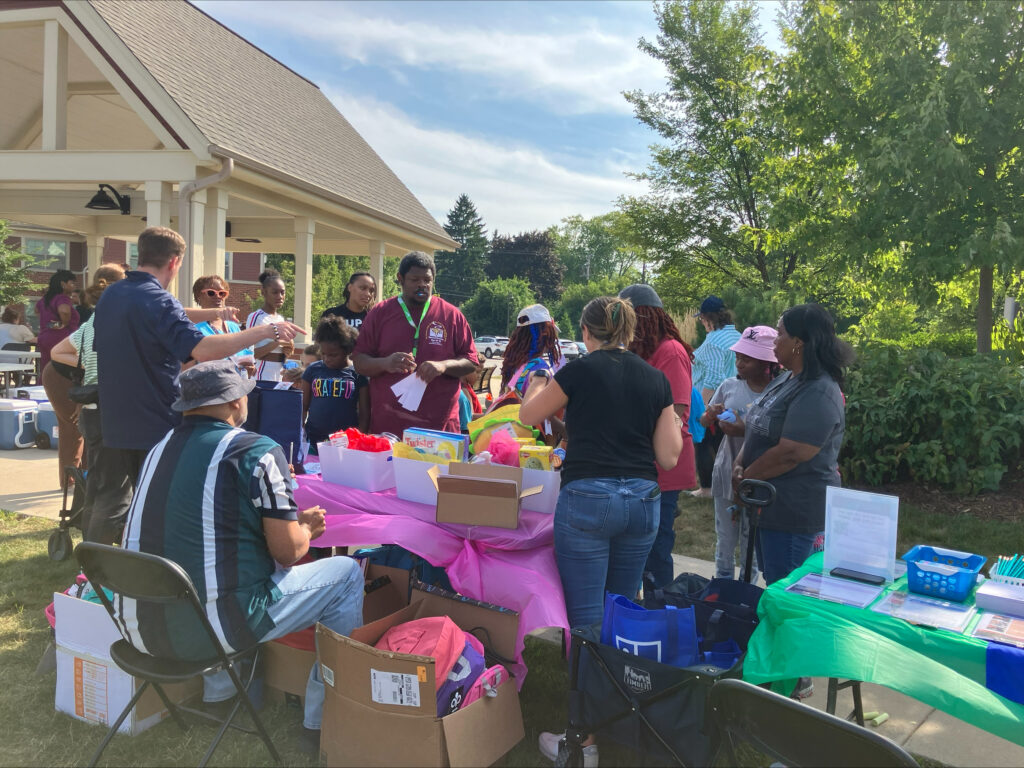 A group of people at a back to school event