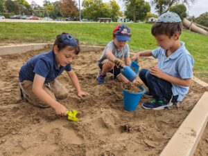 Kids playing in a sandbox