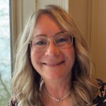 Woman with blonde hair smiling