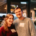 two young people at a holiday event