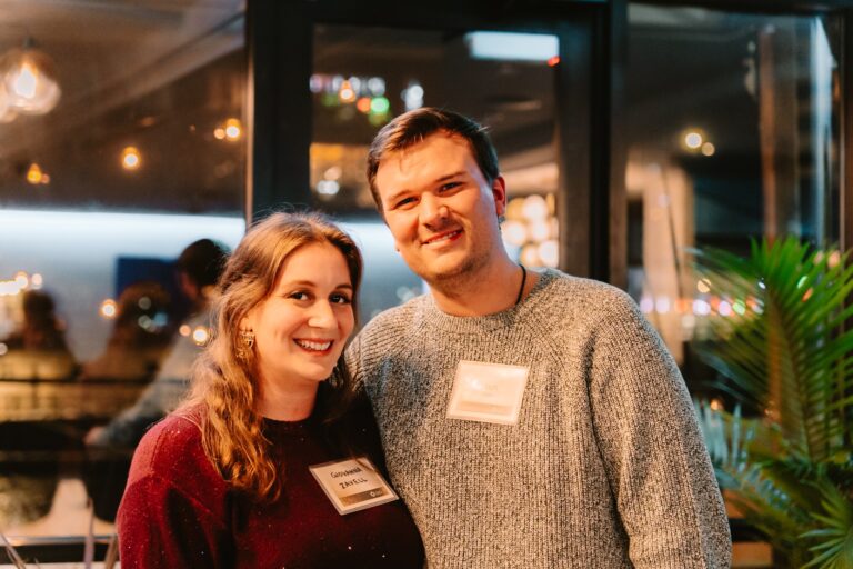 two young people at a holiday event