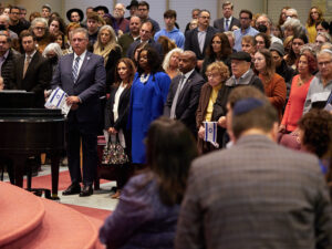 a group of people in a synagogue