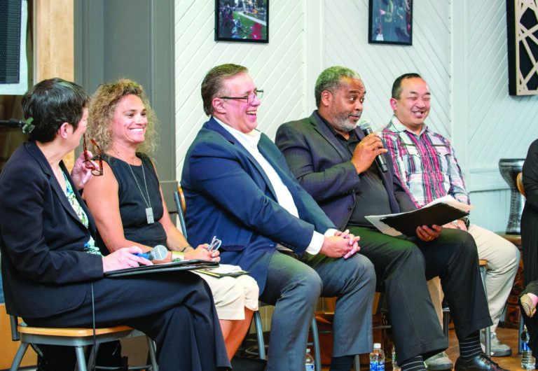 Panel discussion in front of a small audience