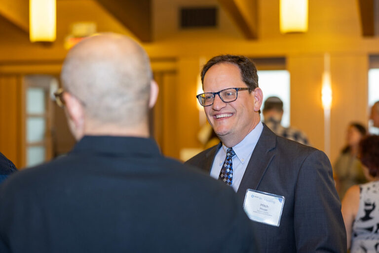 People talking and smiling