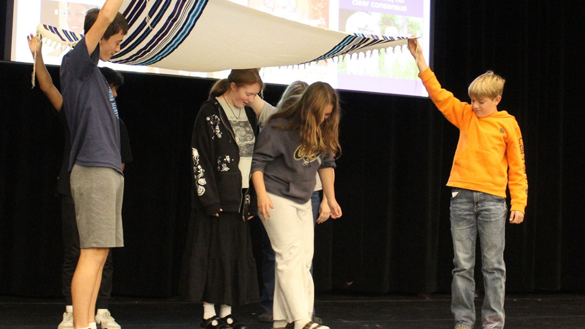 High school students completing Jewish ritual