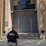 WJSN officer in front of Congregation Beth Jehudah