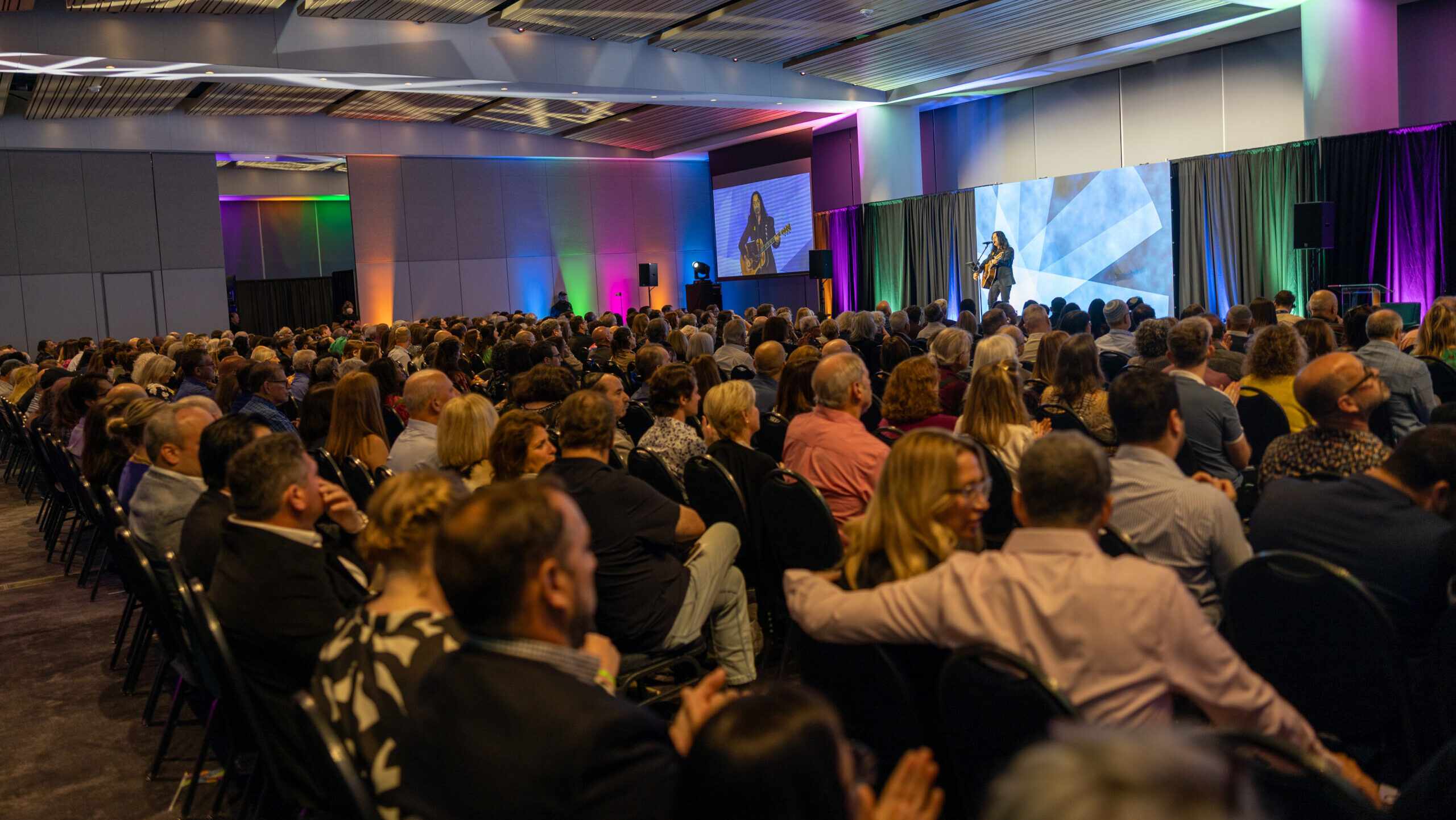 large event with musician on stage