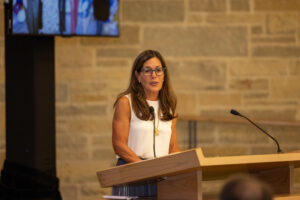 MJF Board Chair speaking at podium