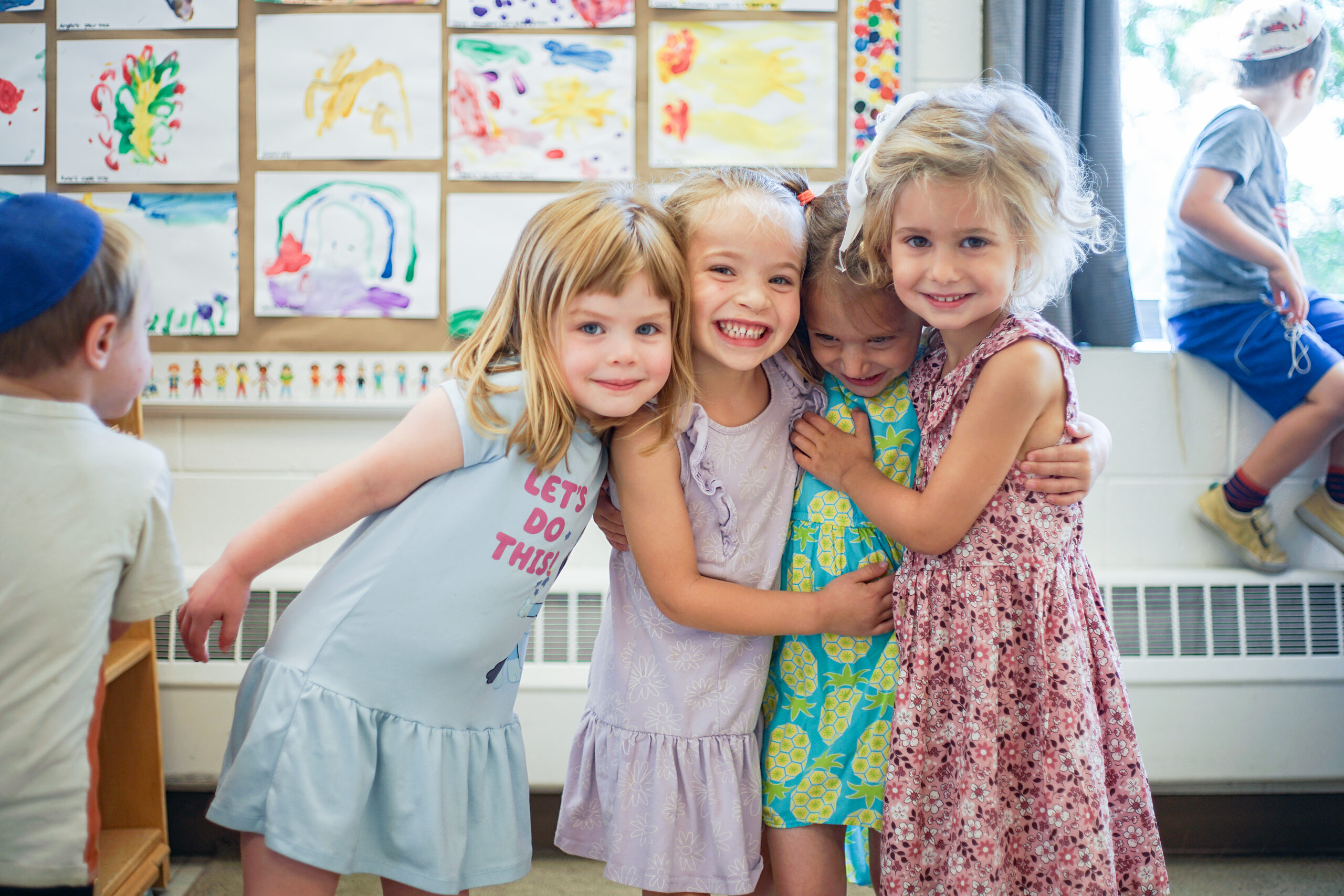 A group of girls hugging